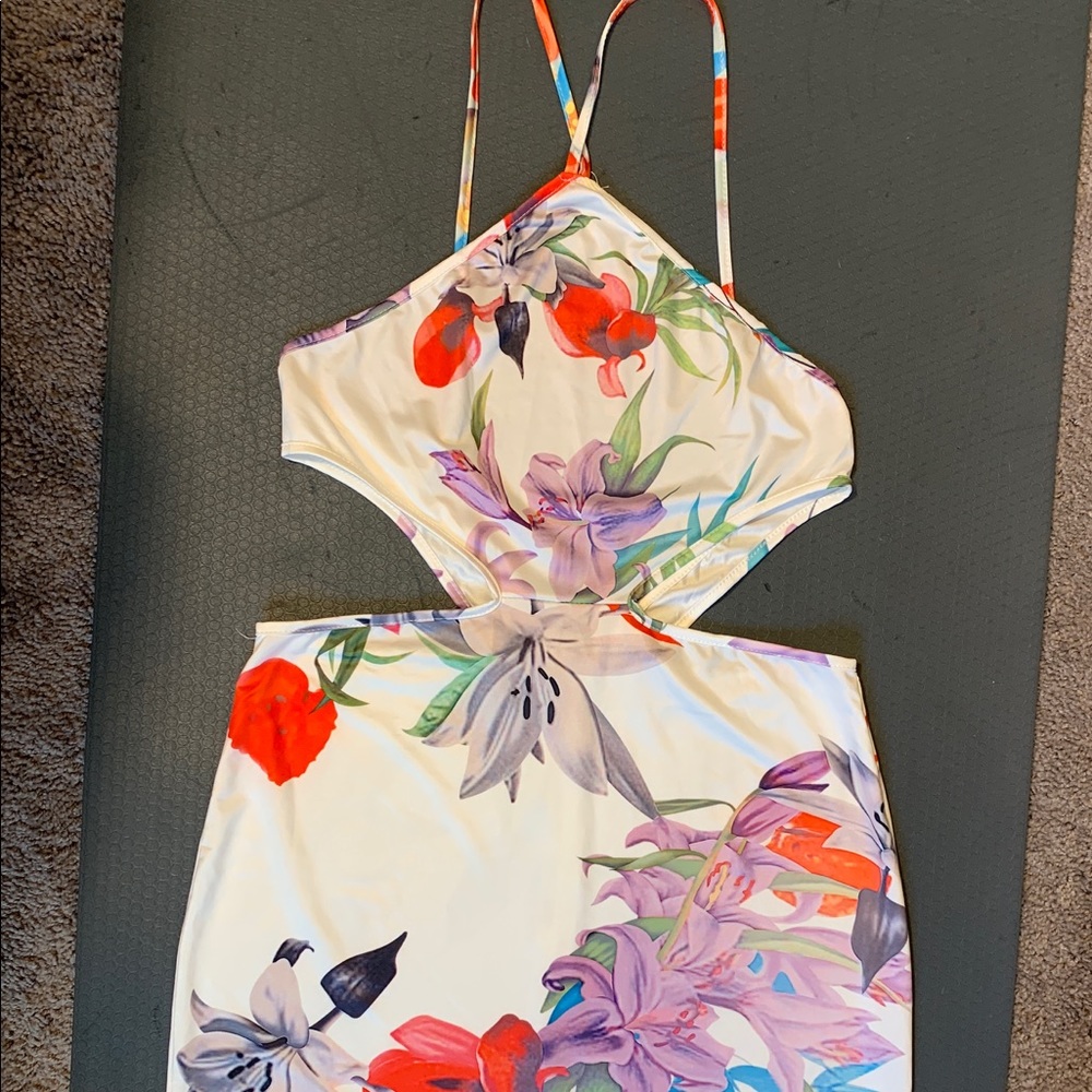 Floral dress with halter top and side cutouts